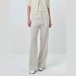 Authentic Gucci wool & silk blend pinstriped low-rise bootcut trousers. 🤍